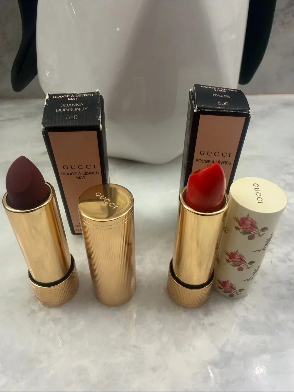 Two Full Size Gucci Lip Sticks